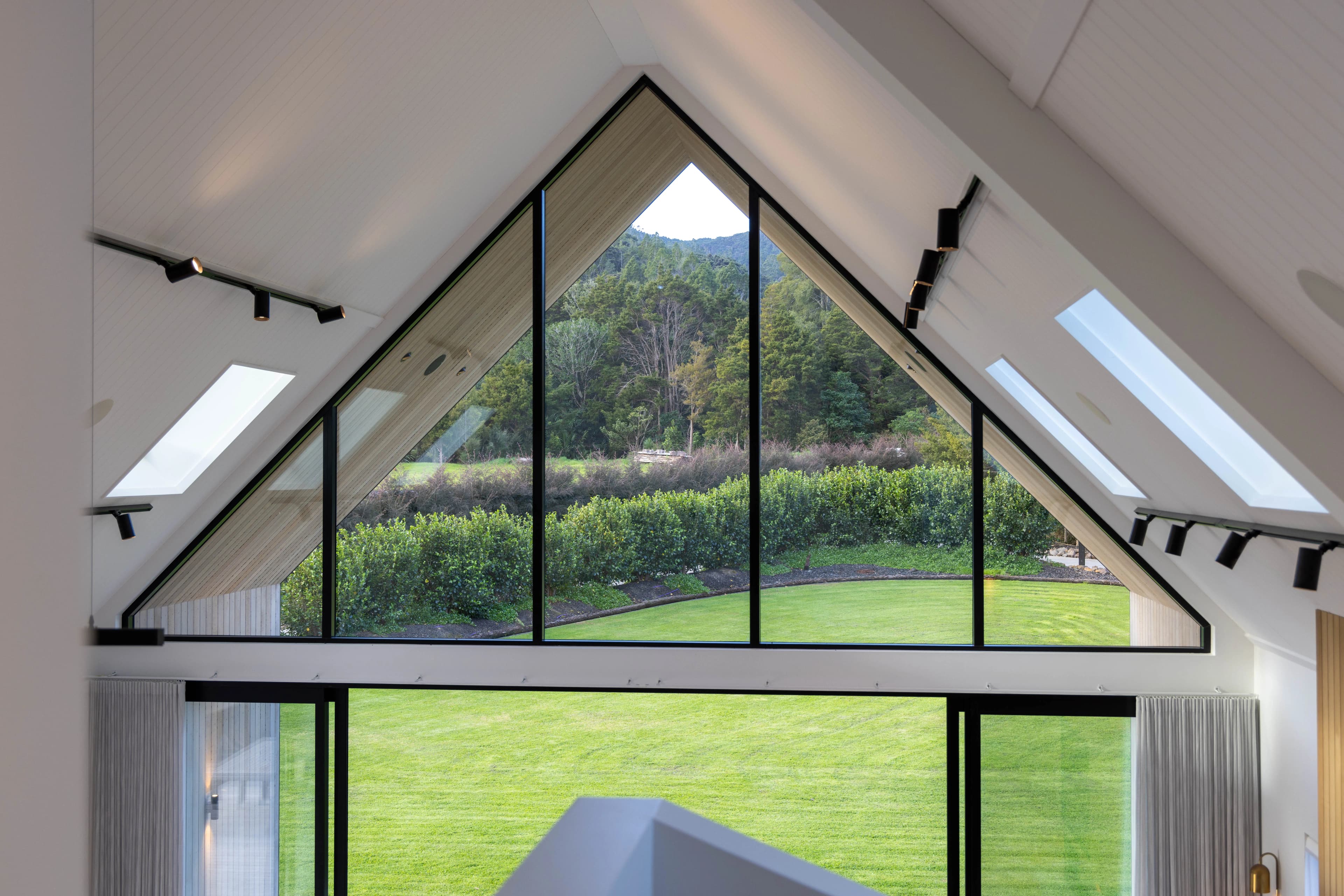Interior living space with large windows and abundant natural light